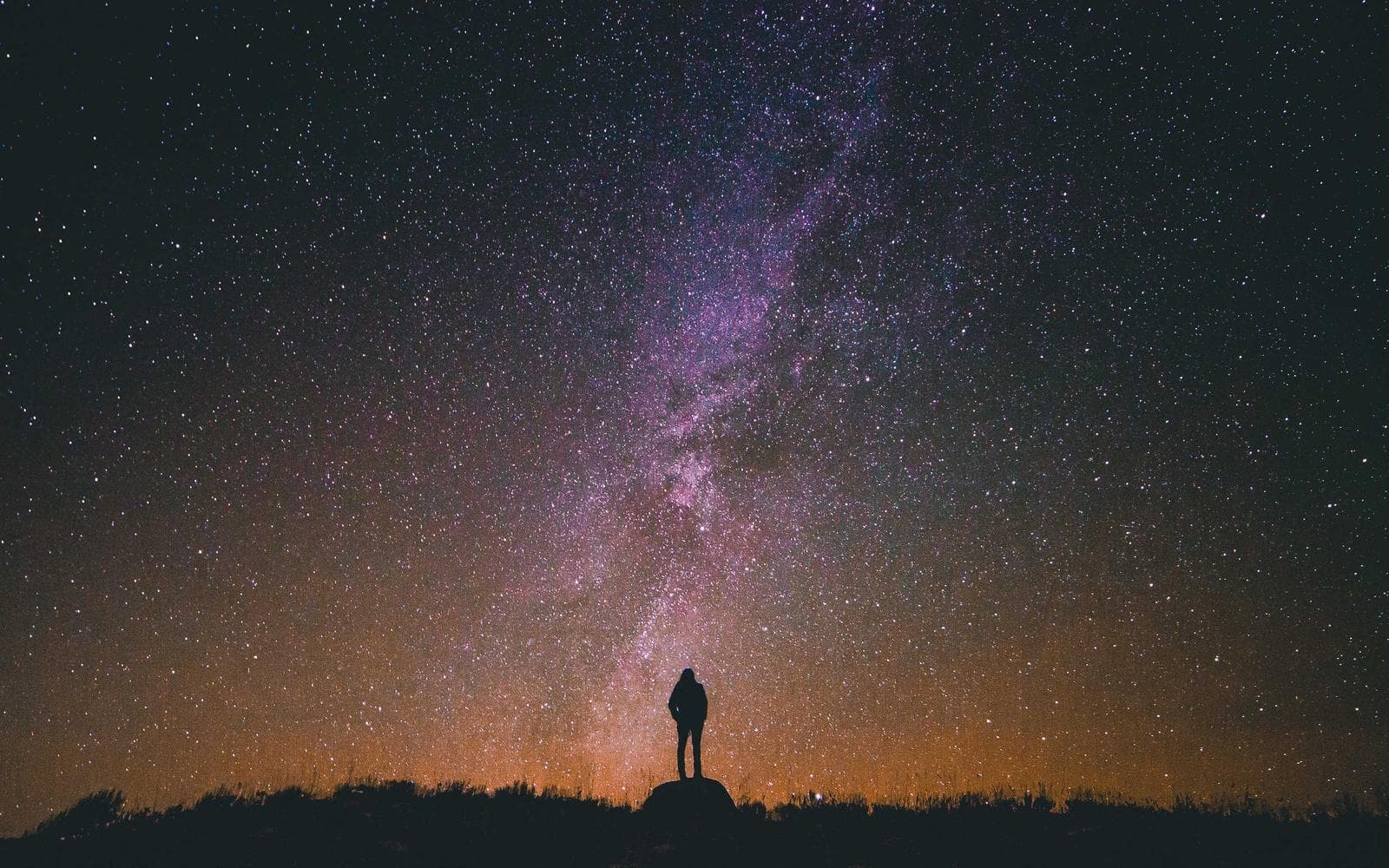 Split-screen code editor comparing JavaScript and TypeScript files